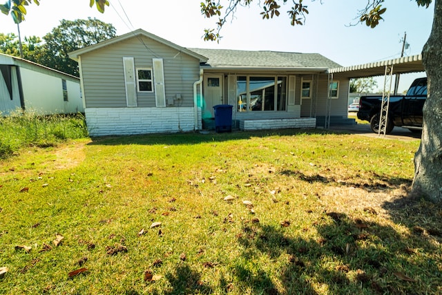 view of front of home with a front yard