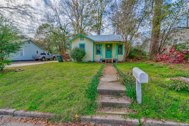 view of front of property with a front lawn