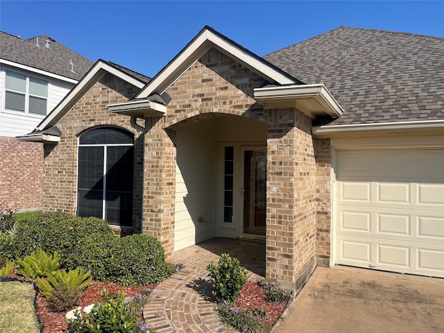 property entrance featuring a garage