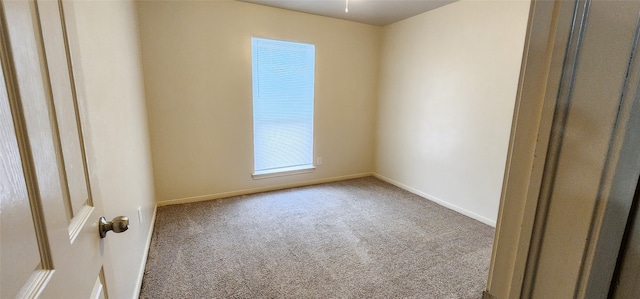 unfurnished room with carpet