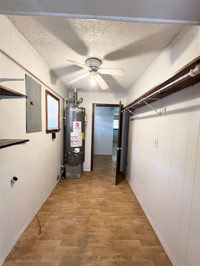 utilities with gas water heater and electric panel