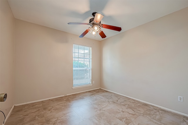 empty room featuring ceiling fan