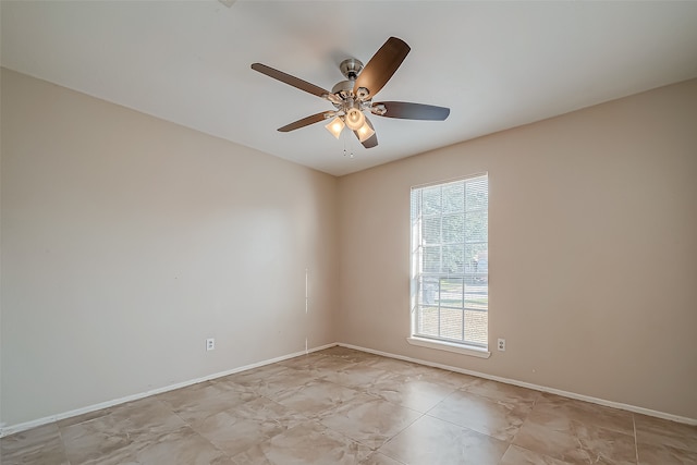 empty room featuring ceiling fan