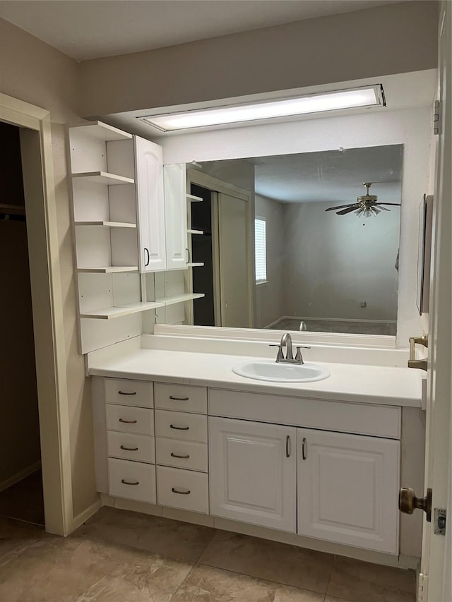 bathroom with vanity and ceiling fan