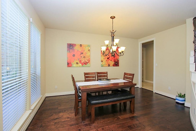 27827 Ramble Rock Ct, Katy, TX 77494 - dining room featuring a chandelier, wood finished floors, and baseboards