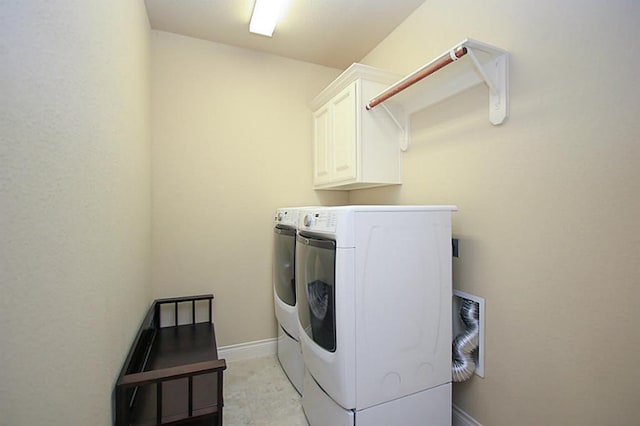 27827 Ramble Rock Ct, Katy, TX 77494 - washroom with independent washer and dryer, cabinet space, and baseboards