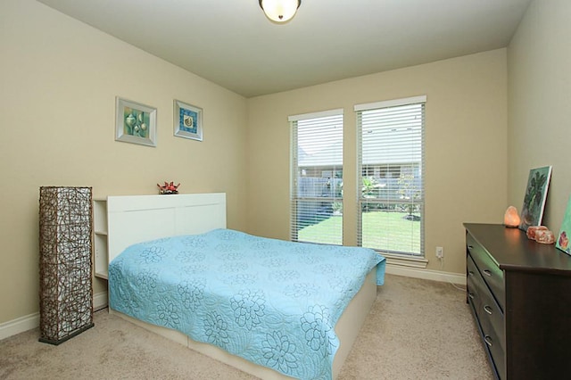 27827 Ramble Rock Ct, Katy, TX 77494 - bedroom with light carpet and baseboards