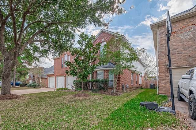 exterior space featuring a front yard and a garage