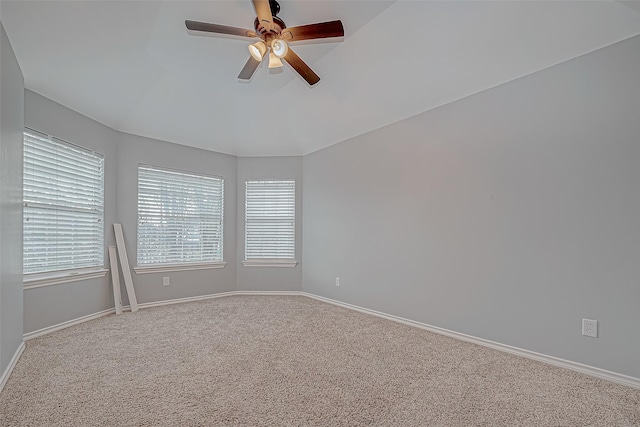 empty room featuring carpet flooring and ceiling fan