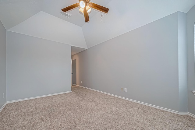 unfurnished room featuring carpet floors, ceiling fan, and lofted ceiling