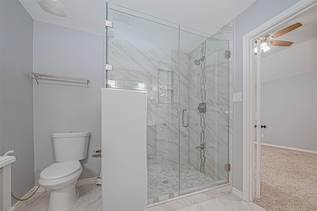 bathroom featuring walk in shower, toilet, and ceiling fan