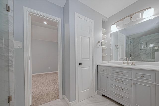 bathroom with vanity and walk in shower