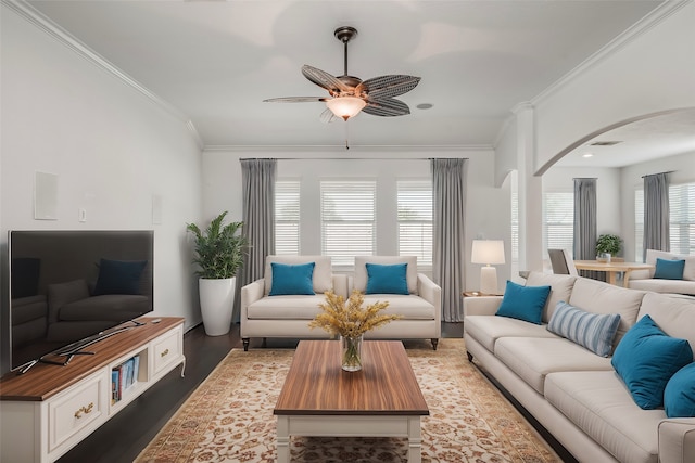 living room featuring ceiling fan, crown molding, and hardwood / wood-style floors