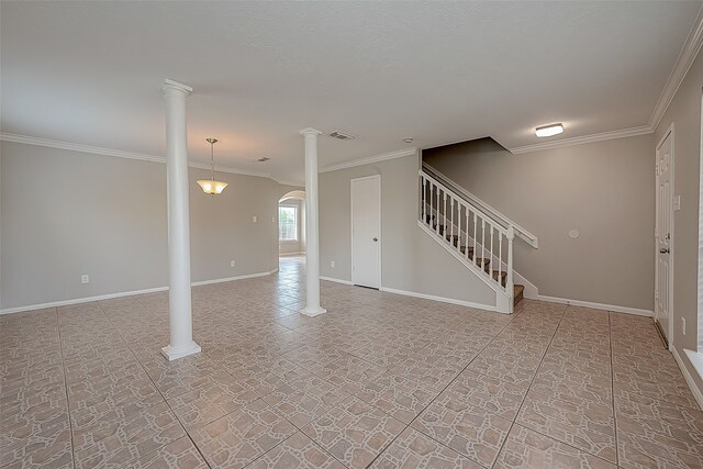 unfurnished living room featuring crown molding