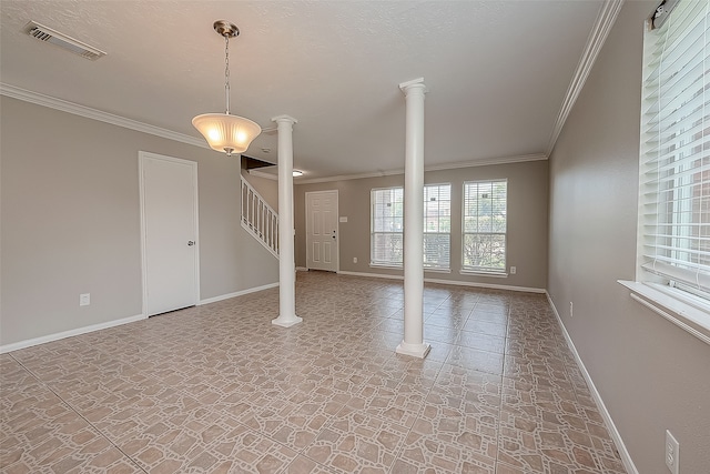 interior space with ornate columns and ornamental molding