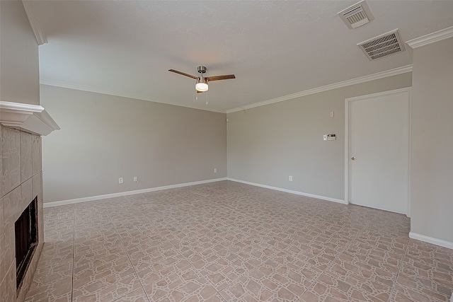 unfurnished living room with ceiling fan, a fireplace, and ornamental molding