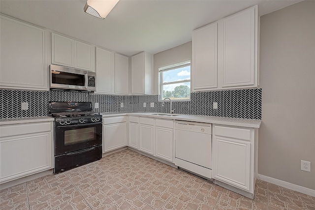 kitchen featuring white cabinets, white dishwasher, sink, black gas range, and backsplash