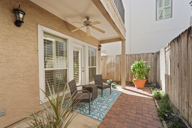 view of patio with ceiling fan