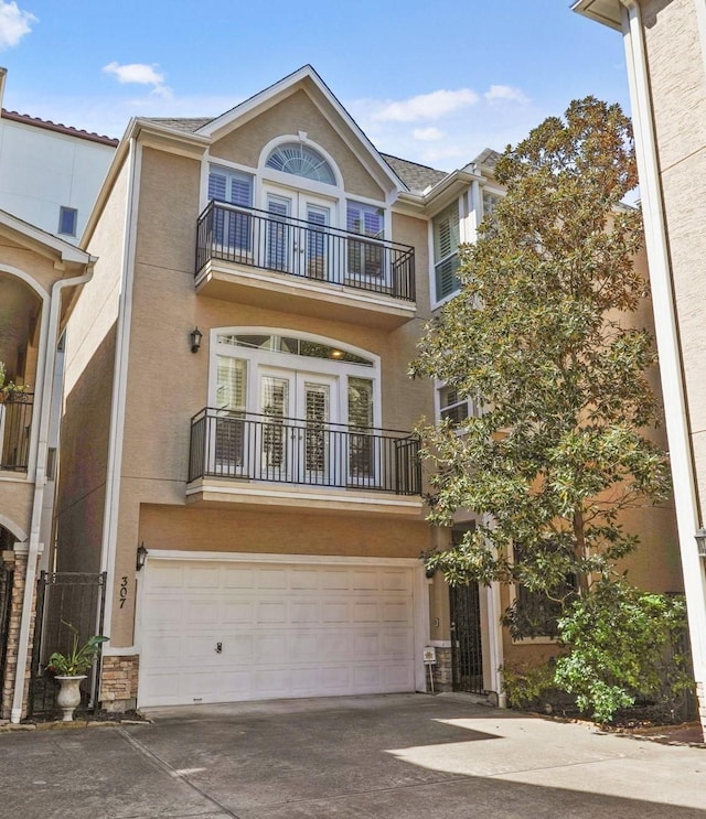 view of front of property with a garage