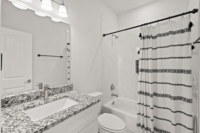 full bathroom featuring vanity, shower / bath combo with shower curtain, and toilet