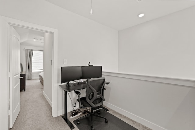 office area with light colored carpet