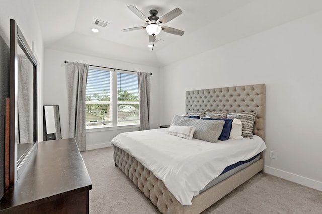 bedroom with light carpet, lofted ceiling, and ceiling fan