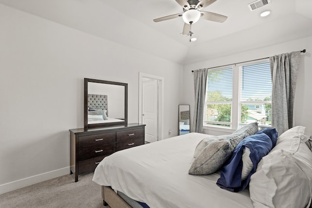 carpeted bedroom featuring lofted ceiling and ceiling fan