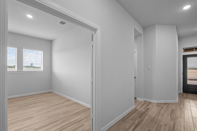 corridor featuring light hardwood / wood-style flooring