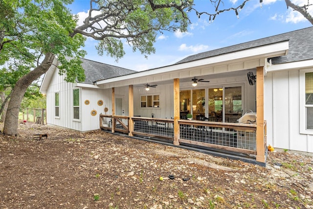 back of property featuring ceiling fan