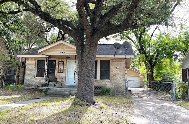 view of front of house featuring covered porch and a garage