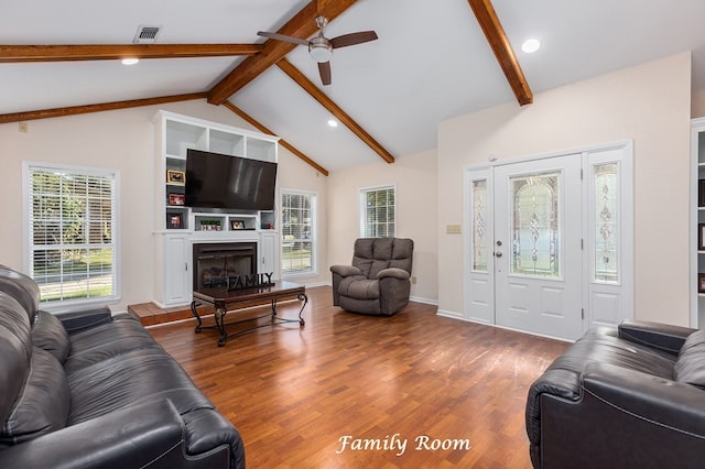 living room featuring beam ceiling, high vaulted ceiling, wood-type flooring, and ceiling fan