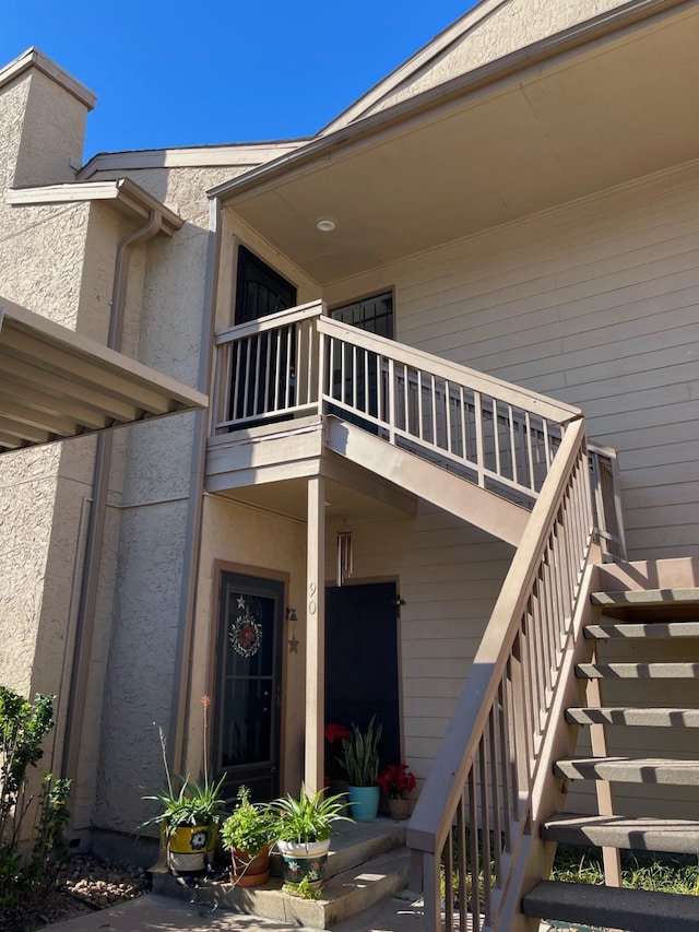 doorway to property featuring a balcony