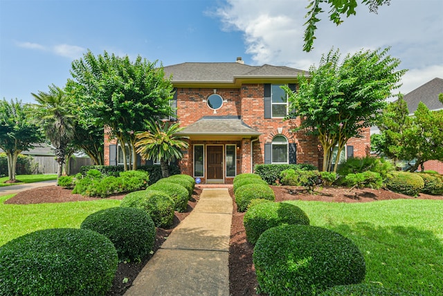 view of front of house with a front lawn