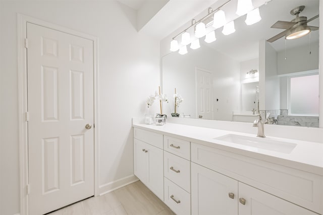 bathroom featuring vanity, tile patterned flooring, and ceiling fan