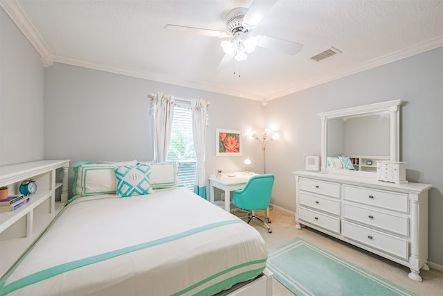 bedroom featuring light carpet, crown molding, a textured ceiling, and ceiling fan