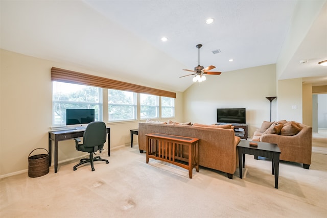 interior space with ceiling fan, lofted ceiling, and light colored carpet