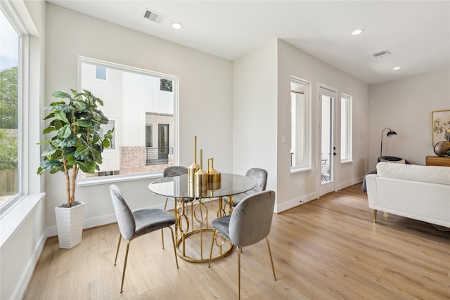 dining room featuring light hardwood / wood-style floors