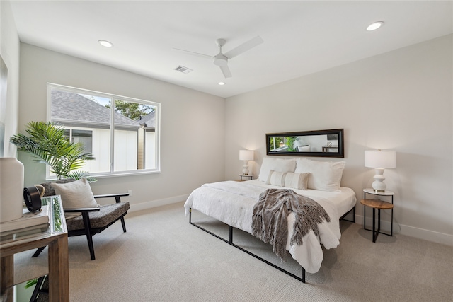 carpeted bedroom with ceiling fan