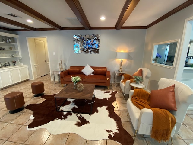 tiled living room featuring beam ceiling, ornamental molding, and built in shelves