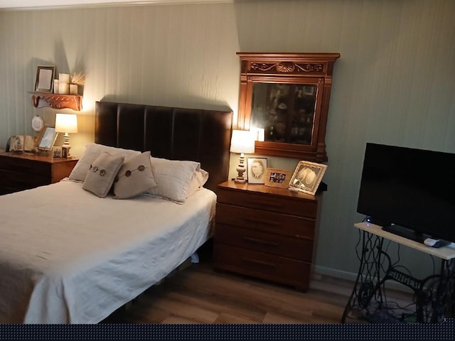 bedroom featuring hardwood / wood-style flooring