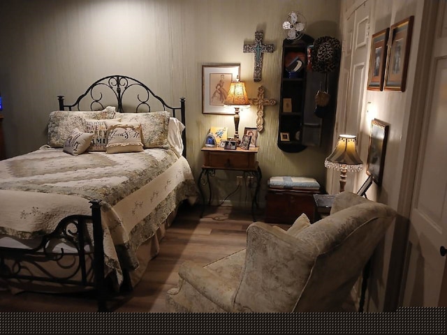 bedroom featuring hardwood / wood-style flooring