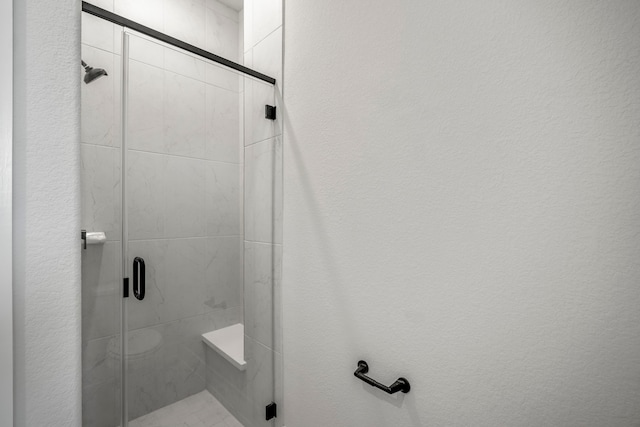 bathroom featuring walk in shower