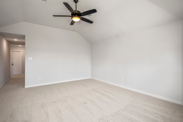 bonus room with lofted ceiling, light colored carpet, and ceiling fan