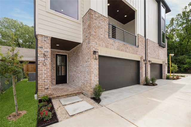 view of front of house with a front yard and a garage