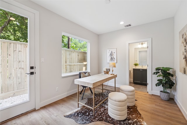 home office featuring light wood-type flooring