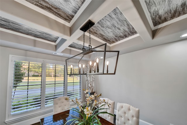 dining area featuring beam ceiling, crown molding, a chandelier, and coffered ceiling