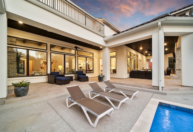 patio terrace at dusk with outdoor lounge area