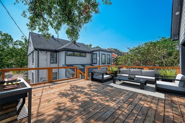 wooden deck featuring an outdoor living space