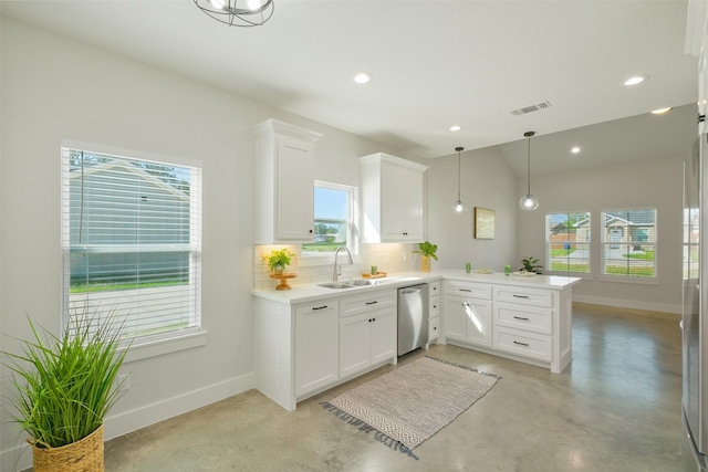 kitchen with sink, white cabinetry, stainless steel dishwasher, kitchen peninsula, and pendant lighting