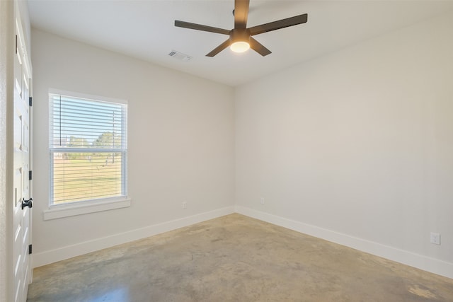 unfurnished room with concrete flooring and ceiling fan